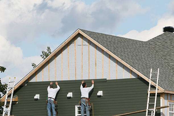 Professional Storm Damage Siding Repair technician working in New Millport, PA